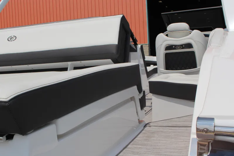 Slide: The Image of 2025 Cobalt R4 boat interior with sleek black and white seating design. - 11