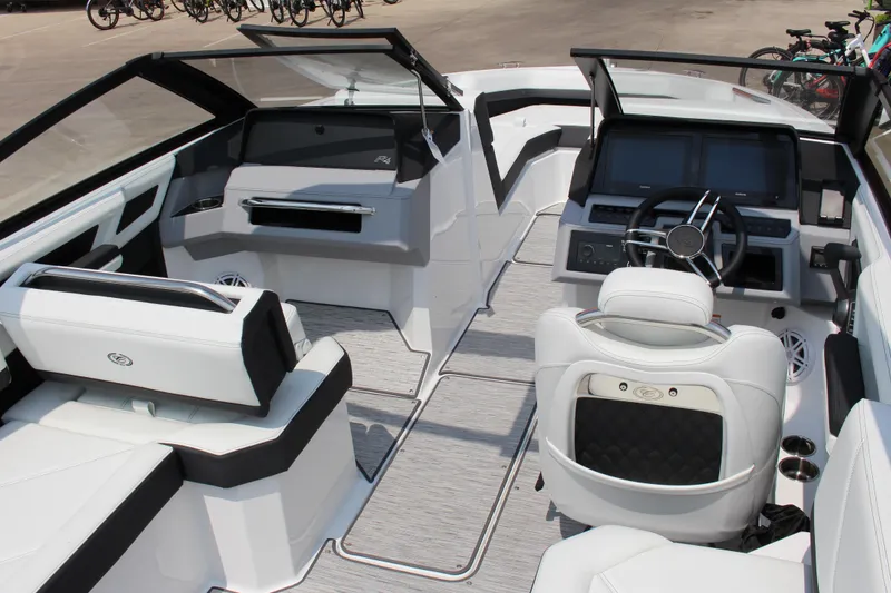 Slide: The Image of Interior of 2025 Cobalt R4 boat, featuring modern dashboard and luxurious seating. - 18