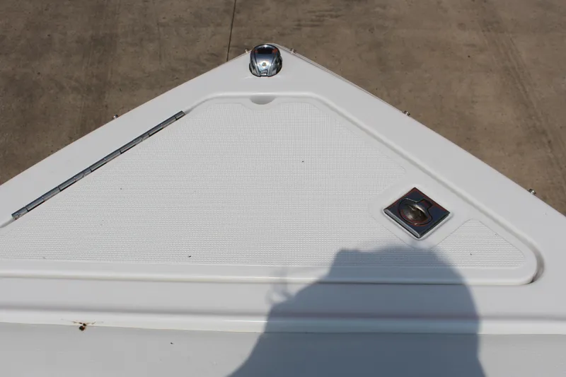 Slide: The Image of Bow of 2025 Cobalt R4 boat with hatch and cleat on deck. - 21