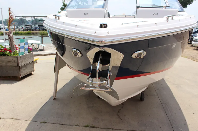 Slide: The Image of 2025 Cobalt R4 boat docked, showcasing sleek design and modern features. - 4