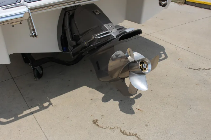 Slide: The Image of 2025 Cobalt R4 boat propeller and stern drive on concrete surface. - 8