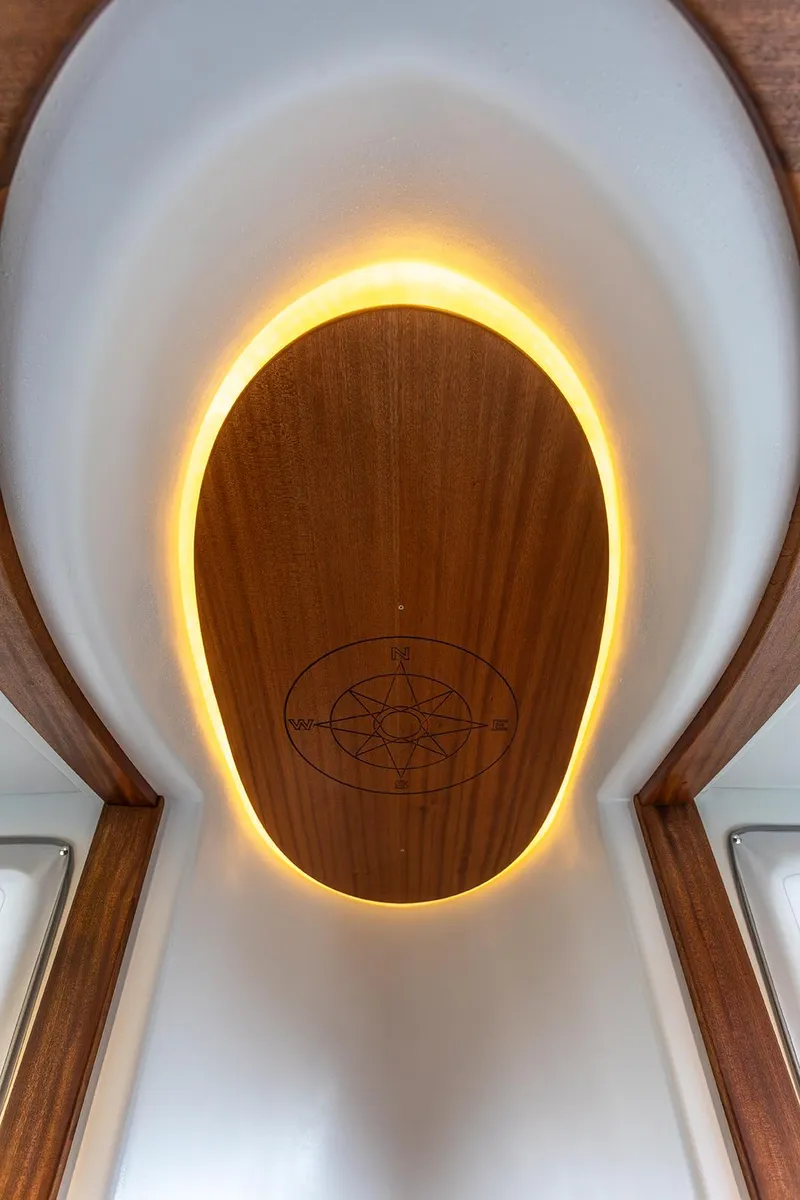 Slide: The Image of Illuminated wooden ceiling detail in 2026 American Tug 362 boat interior. - 28