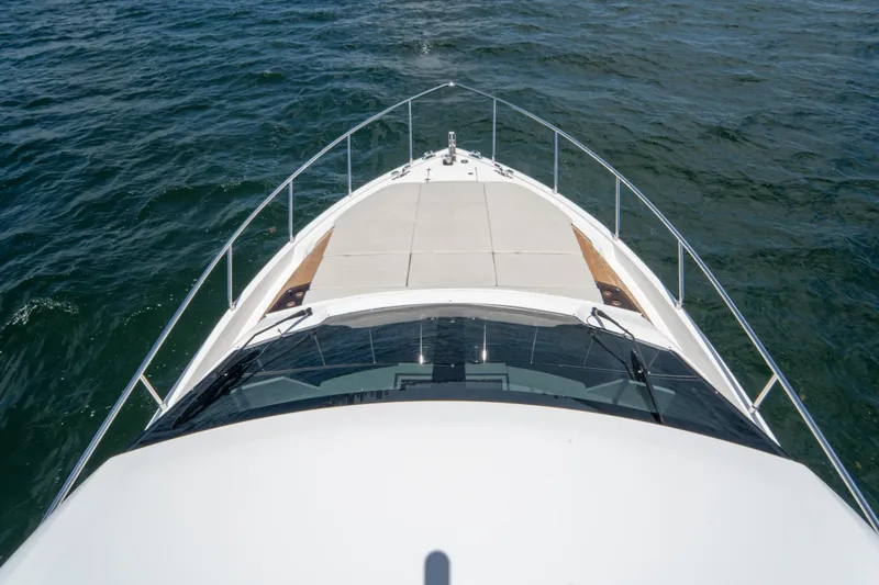 Slide: The Image of 2022 Ferretti Yachts 500 bow view on open water. - 44