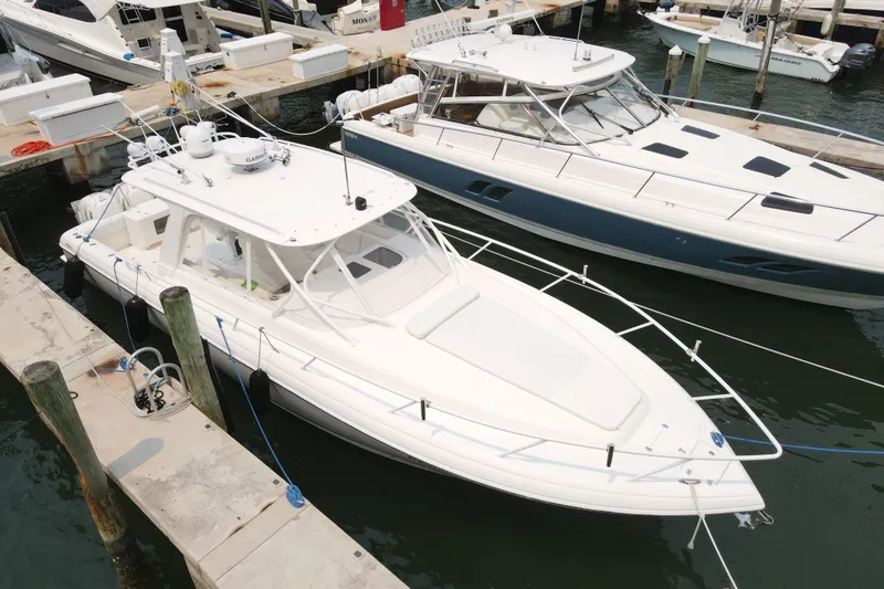 Slide: The Image of 2010 Intrepid 390 Sport Yacht docked at marina, aerial view. - 13