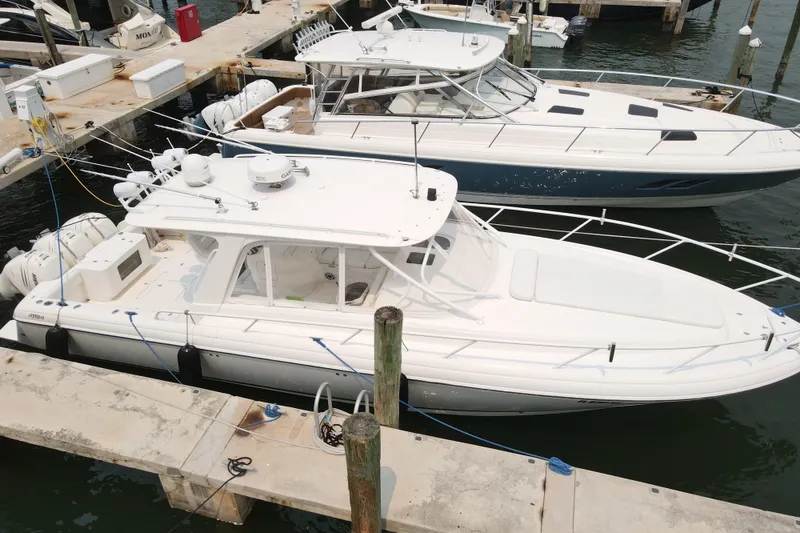 Slide: The Image of 2010 Intrepid 390 Sport Yacht docked at marina, aerial view. - 14