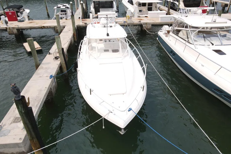 Slide: The Image of Aerial view of a 2010 Intrepid 390 Sport Yacht docked at a marina. - 19