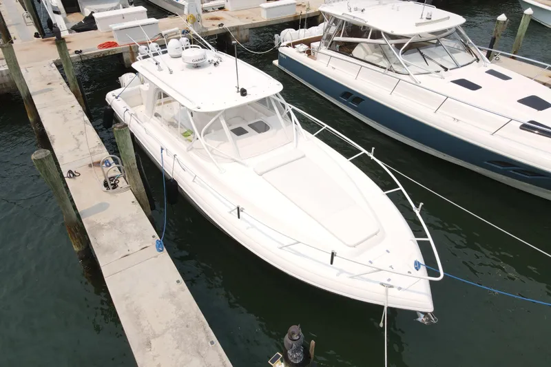 Slide: The Image of 2010 Intrepid 390 Sport Yacht docked at marina, aerial view. - 20