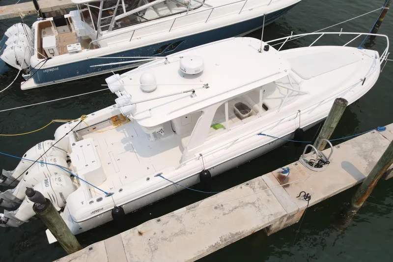Slide: The Image of 2010 Intrepid 390 Sport Yacht docked at marina, aerial view. - 23