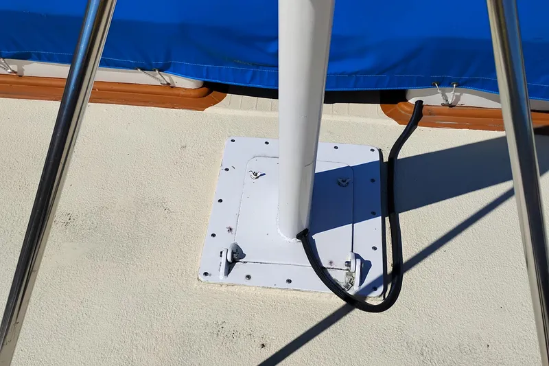 Slide: The Image of Base of mast on 1978 Puget 38 Europa Trawler with blue canvas cover. - 15