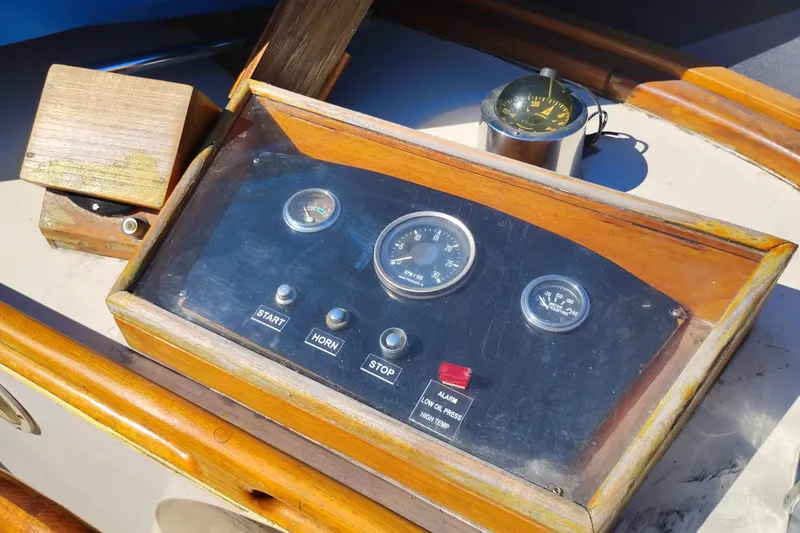Slide: The Image of 1978 Puget 38 Europa Trawler dashboard with gauges and compass. - 20