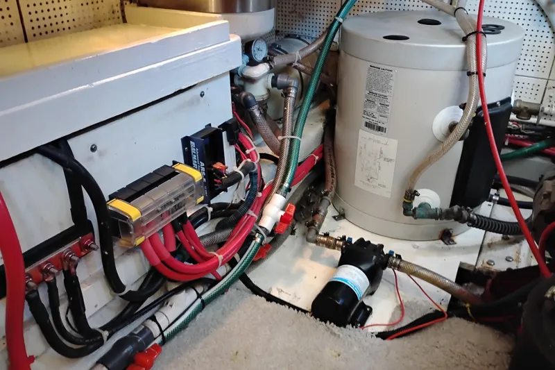 Slide: The Image of Engine room of a 1978 Puget 38 Europa Trawler with wiring and equipment. - 70