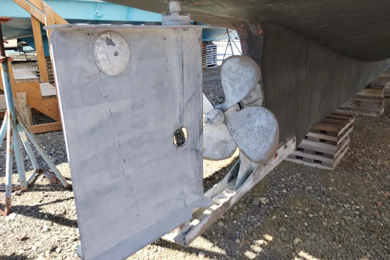 Slide: The Image of 1978 Puget 38 Europa Trawler propeller and rudder detail on dry dock. - 71