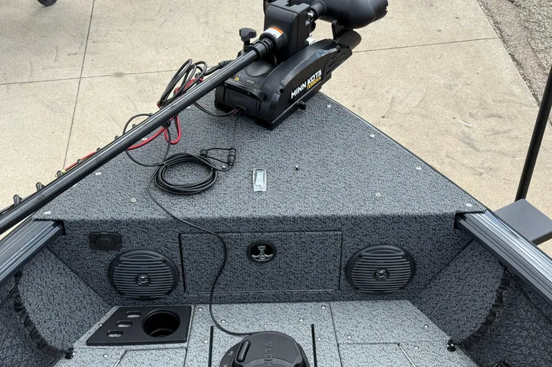 Slide: The Image of 2026 Lund 1775 Impact XS Sport boat deck with Minn Kota trolling motor. - 12