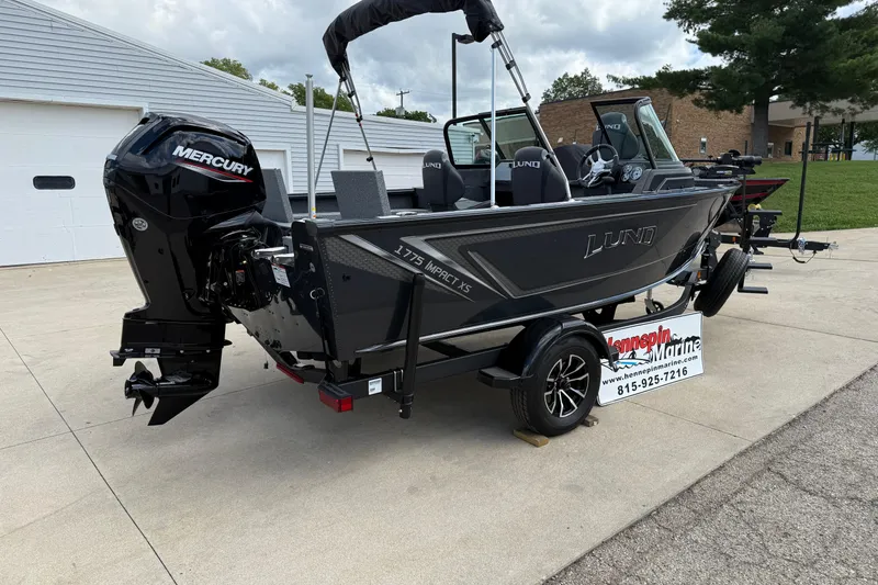 Slide: The Image of 2026 Lund 1775 Impact XS Sport boat with Mercury engine on trailer. - 8