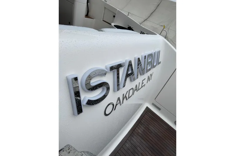 Slide: The Image of Azimut 55 Fly 2008 yacht with "Istanbul, Oakdale, NY" lettering on deck. - 10