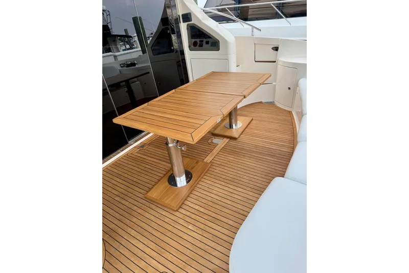 Slide: The Image of Luxury teak deck and table on 2008 Azimut 55 Fly yacht. - 17