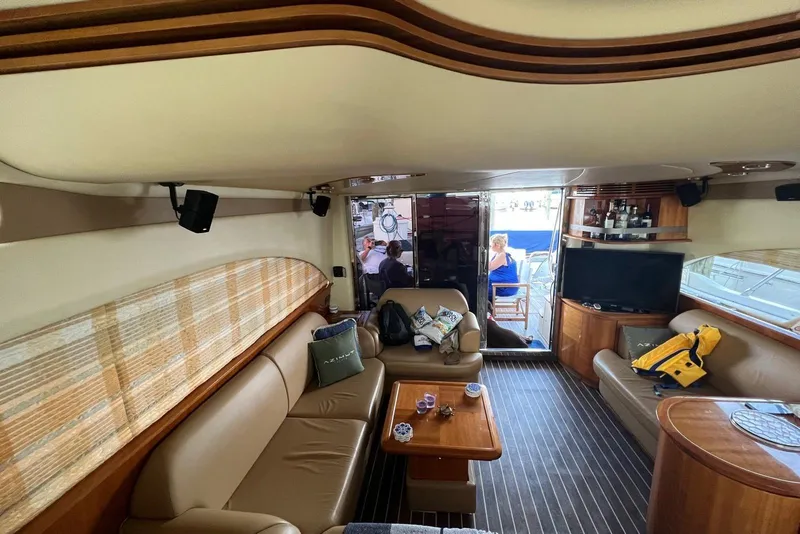 Slide: The Image of Luxurious interior of 2008 Azimut 55 Fly yacht with elegant seating and entertainment area. - 34