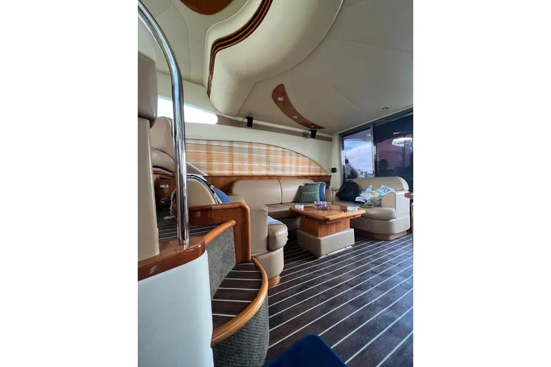 Slide: The Image of Luxurious interior of 2008 Azimut 55 Fly yacht with elegant seating and wooden accents. - 39