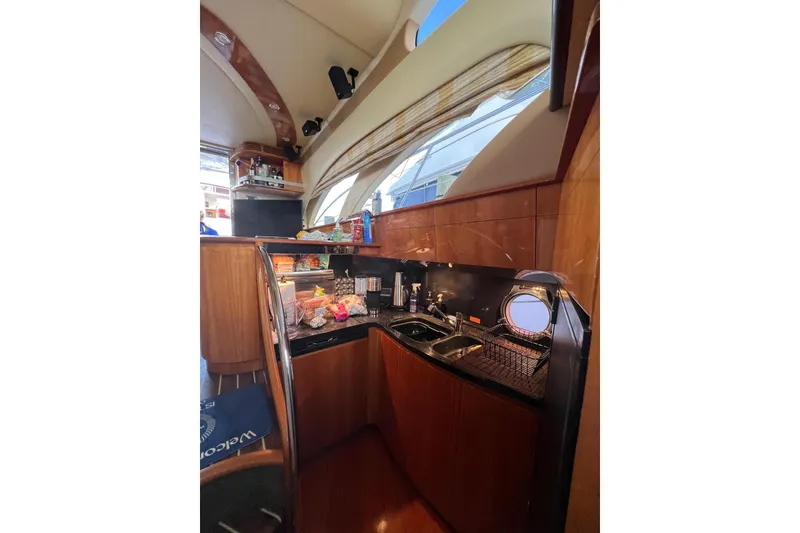 Slide: The Image of Luxurious kitchen interior of 2008 Azimut 55 Fly yacht with modern amenities. - 40