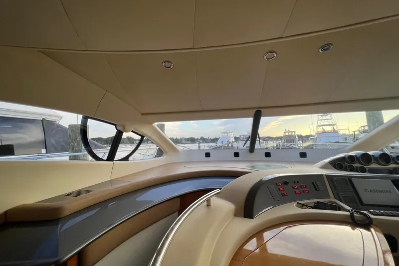 Slide: The Image of Interior view of 2008 Azimut 55 Fly yacht cockpit with modern controls and panoramic windows. - 42