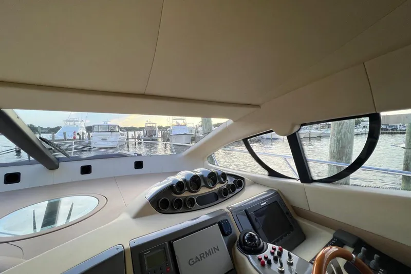 Slide: The Image of Interior view of 2008 Azimut 55 Fly yacht cockpit with navigation equipment. - 43