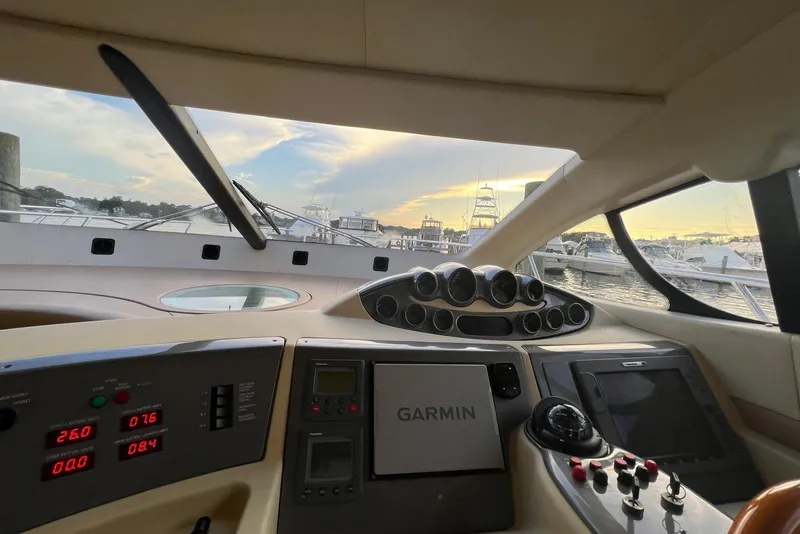 Slide: The Image of Cockpit view of 2008 Azimut 55 Fly yacht with Garmin navigation system at sunset. - 44