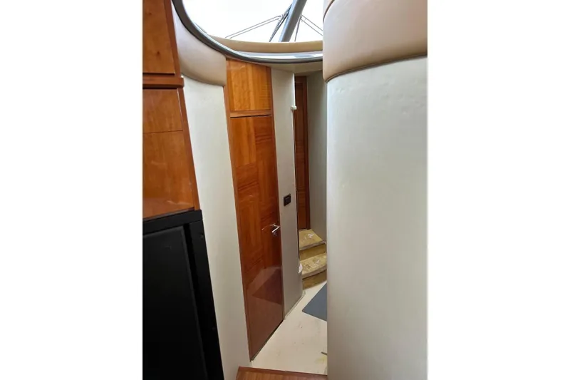 Slide: The Image of Interior hallway of 2008 Azimut 55 Fly yacht with wooden doors and stairs. - 45