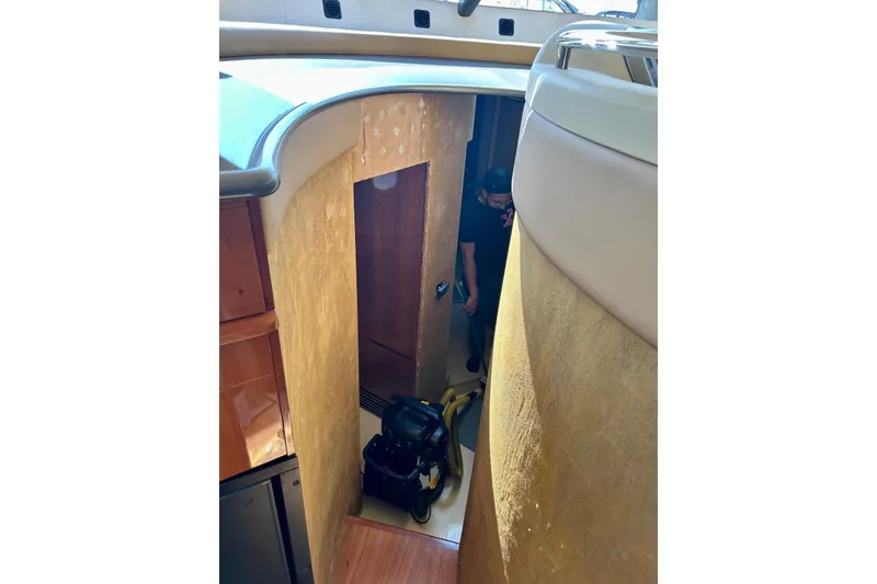 Slide: The Image of Interior view of 2008 Azimut 55 Fly yacht, featuring a narrow passageway and modern design. - 47