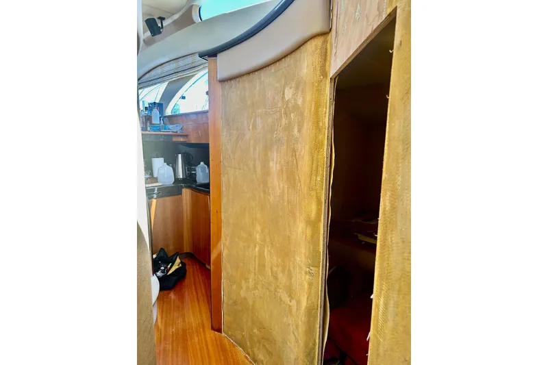 Slide: The Image of Interior view of 2008 Azimut 55 Fly yacht, featuring a compact kitchen area. - 48