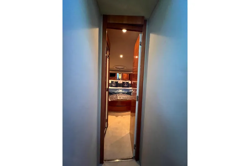 Slide: The Image of Interior view of 2008 Azimut 55 Fly yacht cabin through doorway. - 51