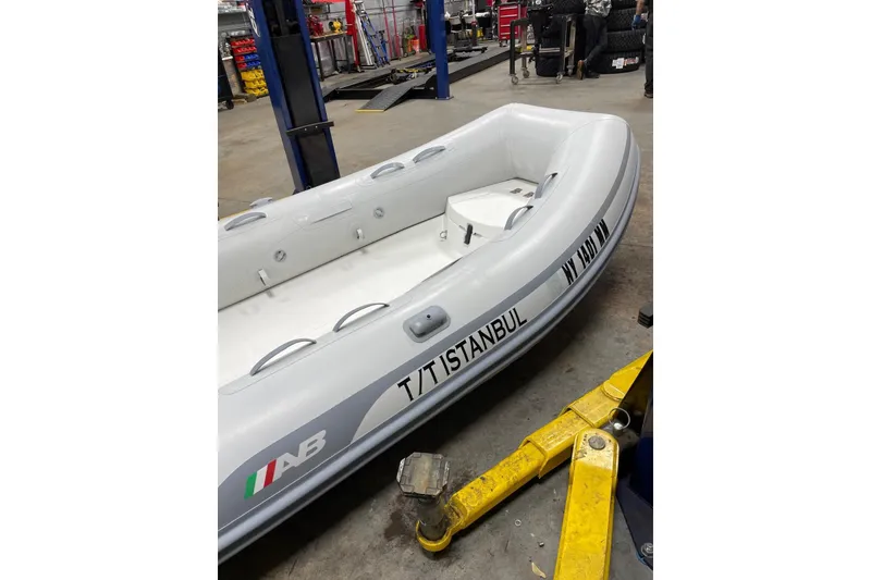 Slide: The Image of Inflatable boat in workshop, labeled 'T/T Istanbul', associated with 2008 Azimut 55 Fly. - 67