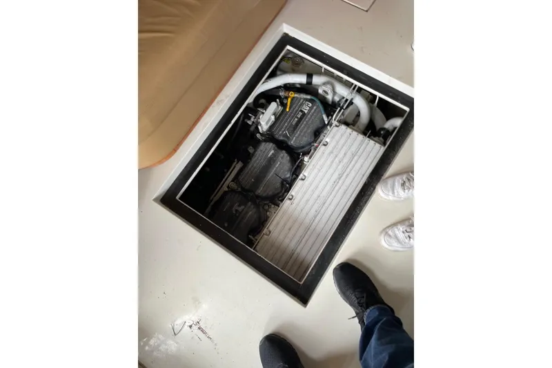 Slide: The Image of Engine compartment of a 2008 Azimut 55 Fly yacht, showing mechanical components. - 69