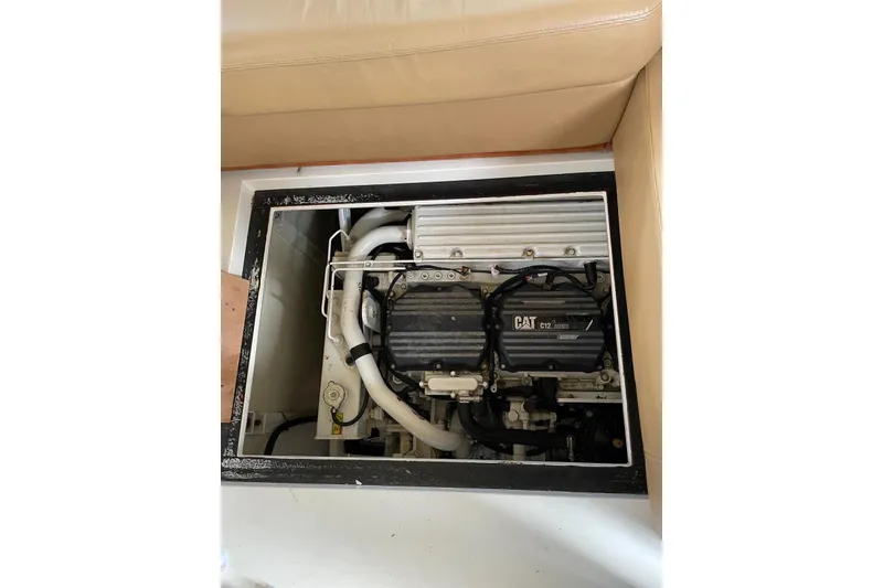 Slide: The Image of Engine compartment of 2008 Azimut 55 Fly yacht, featuring CAT C12 engine. - 71