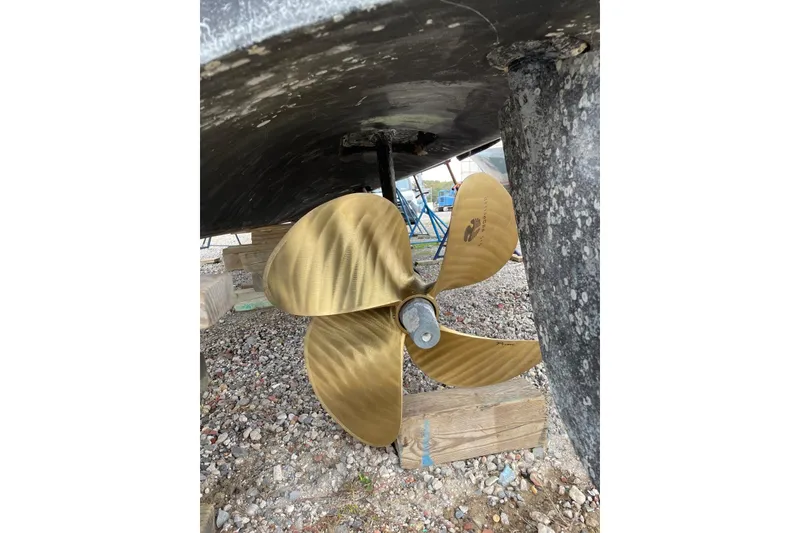 Slide: The Image of Golden propeller of a 2008 Azimut 55 Fly yacht on dry dock. - 73