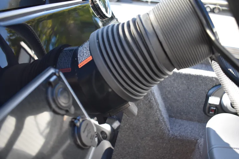 Slide: The Image of 2026 Lowe Stinger 175C boat interior with gray and white seating. - 30