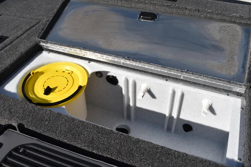 Slide: The Image of Dashboard of 2026 Lowe Stinger 175C boat with RPM gauge and control switches. - 36