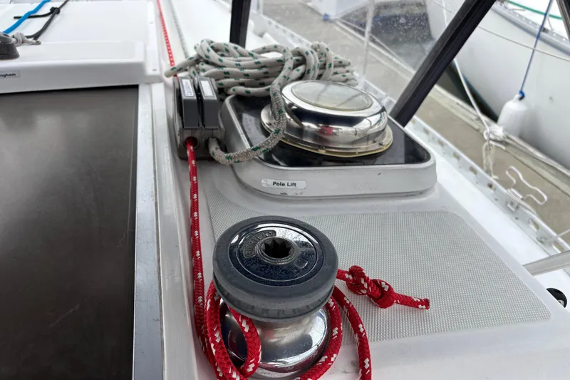 Slide: The Image of Deck of 1988 J Boats J/28 sailboat with winch and ropes. - 13