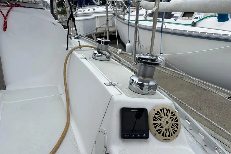 Slide: The Image of Cockpit of 1988 J Boats J/28 sailboat with winches and navigation equipment. - 19