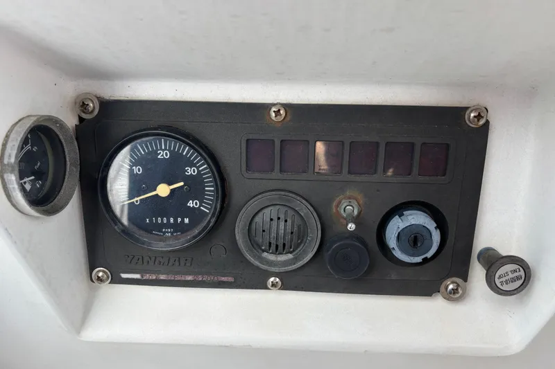 Slide: The Image of Control panel of a 1988 J Boats J/28 sailboat with Yanmar tachometer. - 21