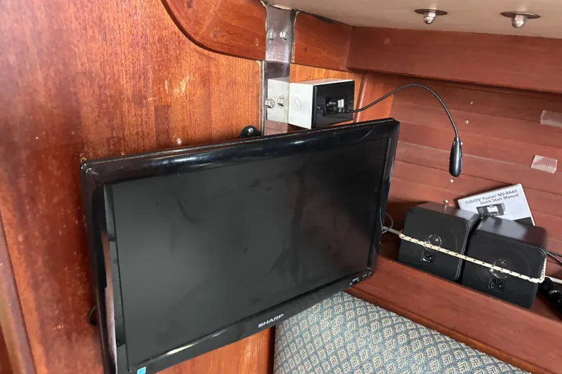 Slide: The Image of Interior of 1988 J Boats J/28 with mounted TV and audio equipment. - 25