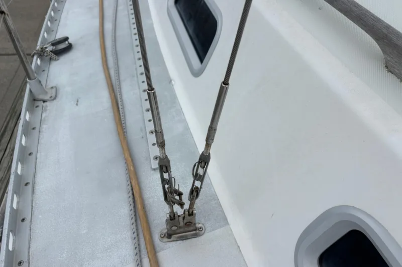 Slide: The Image of Deck view of 1988 J Boats J/28 sailboat, showing rigging and fittings. - 6