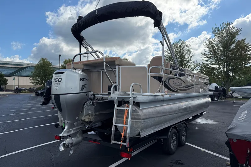 Slide: The Image of 2008 Parti Kraft 240RE pontoon boat with Honda 150 VTEC engine on trailer. - 2
