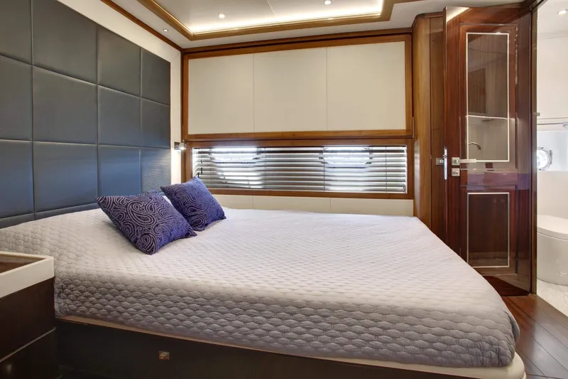 Slide: The Image of Luxurious bedroom interior of 2026 Selene 92 Ocean Explorer yacht with modern design. - 12