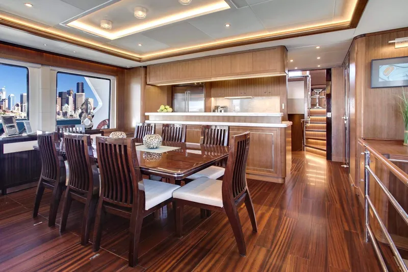 Slide: The Image of Luxurious dining area on 2026 Selene 92 Ocean Explorer yacht with city skyline view. - 3