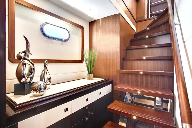 Slide: The Image of Luxurious interior of 2026 Selene 92 Ocean Explorer yacht with elegant wooden staircase. - 9