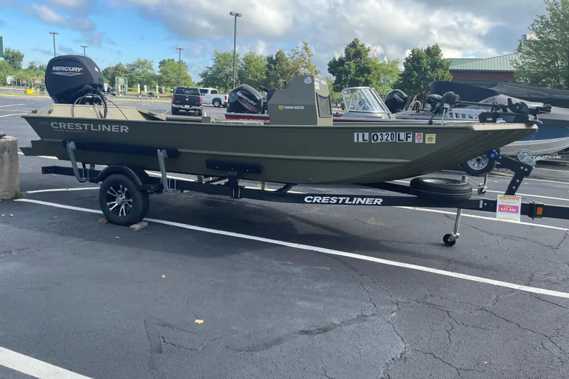 Slide: The Image of 2024 Crestliner 1870 Retriever FCC boat on trailer in parking lot. - 5