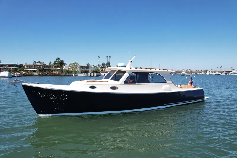 Slide: The Image of 2002 Palm Beach Motor Yachts Avalon 38 cruising on a sunny day. - 1