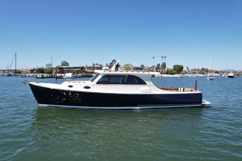 Slide: The Image of 2002 Palm Beach Motor Yachts Avalon 38 cruising on a sunny day. - 2