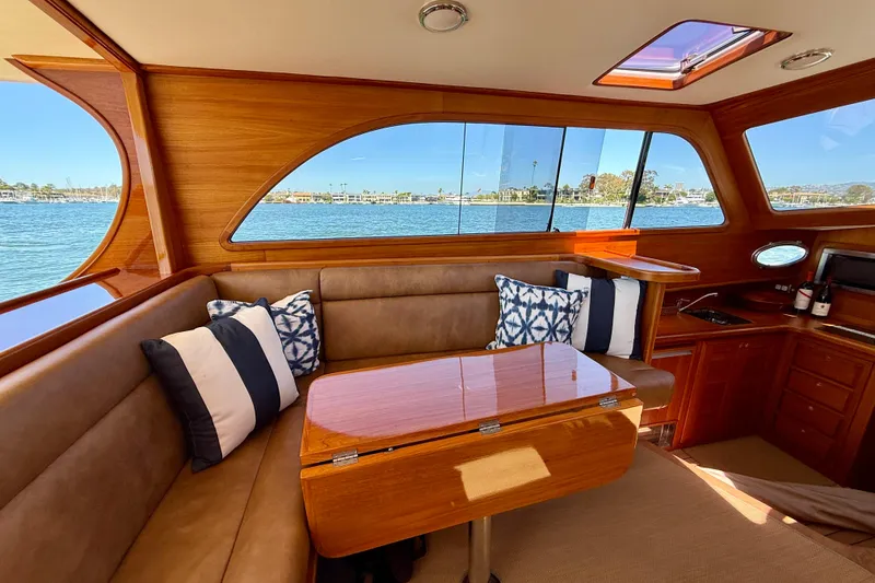 Slide: The Image of Luxurious interior of 2002 Palm Beach Motor Yachts Avalon 38 with elegant wood finish. - 20