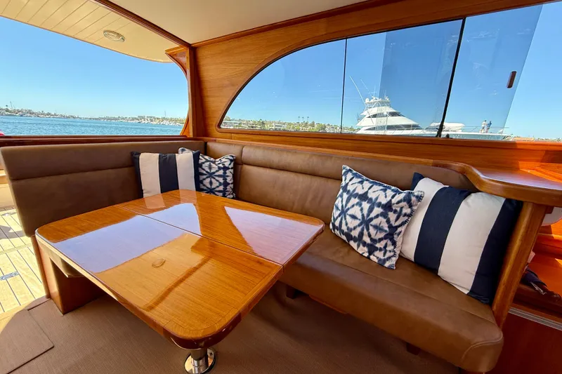 Slide: The Image of Luxurious interior of 2002 Palm Beach Motor Yachts Avalon 38 with elegant seating and scenic view. - 21